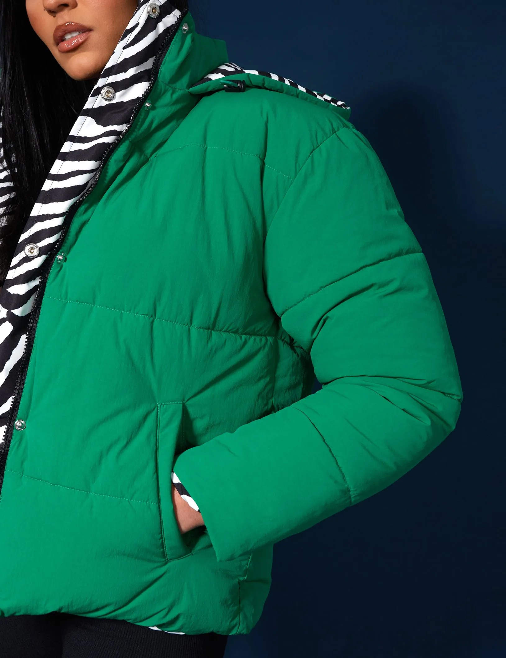 REVERSIBLE QUILTED PUFFER GREEN AND ZEBRA